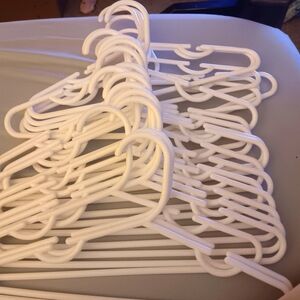 Set of 21 white children's hangers